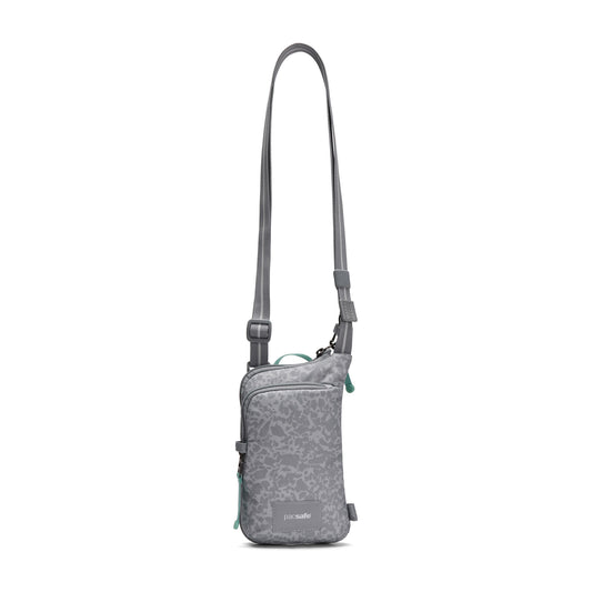 Product Image – Pacsafe® GO Anti-Theft Tech Crossbody by Pacsafe: floral, adjustable strap, front zip pocket—perfect for travel.