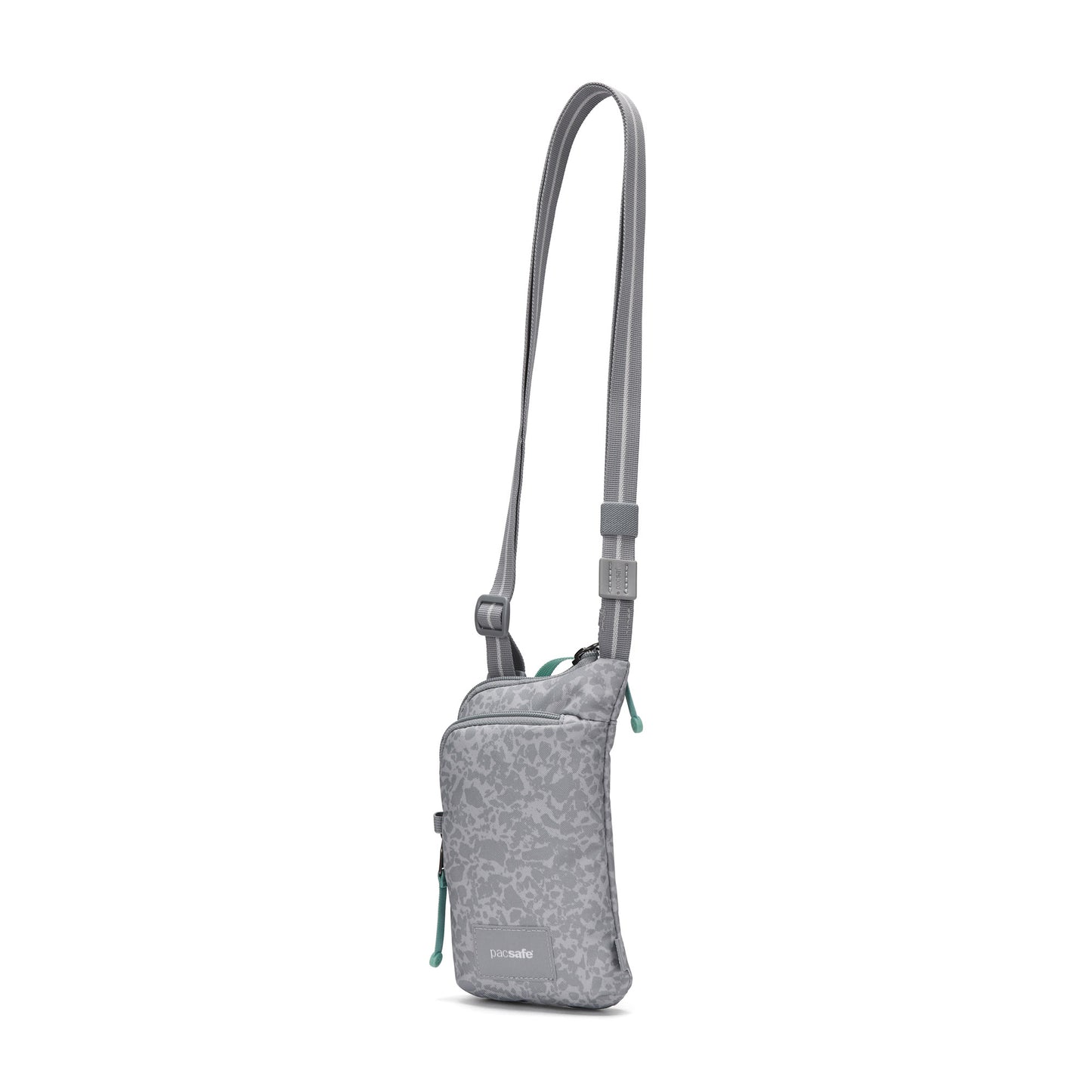 Pacsafe® GO Anti-Theft Tech Crossbody: RFID-secure, adjustable strap, front zip pocket, subtle pattern.