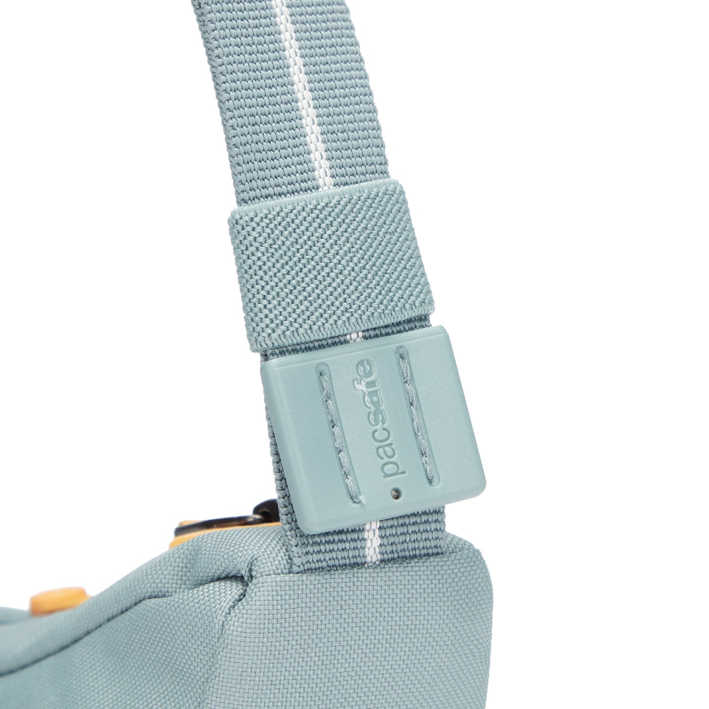 Close up of shoulder strap on fresh mint Pacsafe® GO Anti-Theft Lunar Crossbody