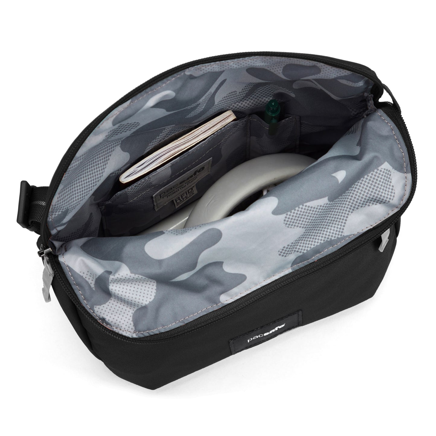 The Pacsafe® GO Anti-Theft Saddle Crossbody by Pacsafe fits a wallet, pen, and small item; features camo lining.