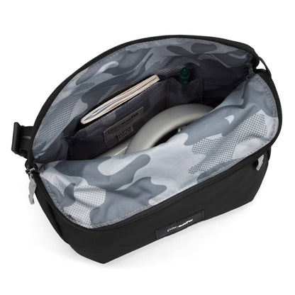 The Pacsafe® GO Anti-Theft Saddle Crossbody by Pacsafe fits a wallet, pen, and small item; features camo lining.