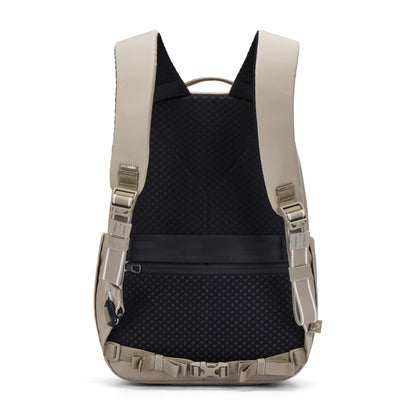 Pacsafe® V 16L Anti-theft Backpack in tan/black with padded straps, buckles, and a laptop sleeve.