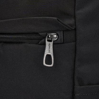 Close-up of the Pacsafe® V 20L Anti-theft City Backpack in black recycled polyester with a metal zipper.