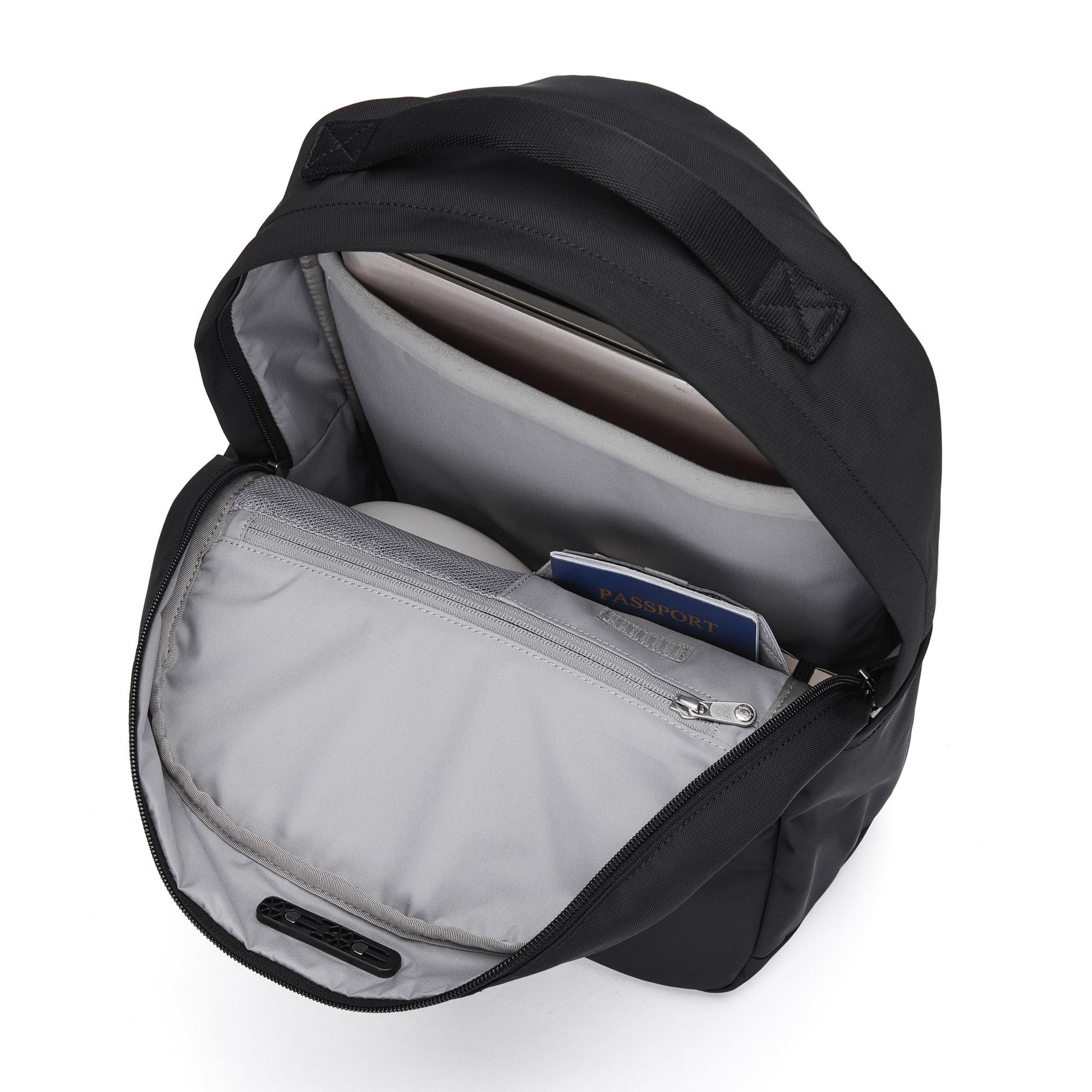 Open Pacsafe® V 20L Anti-theft City Backpack with padded laptop sleeve, water bottle, and passport inside.