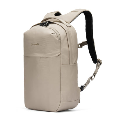 Pacsafe® V 20L Anti-theft City Backpack in beige with one strap, laptop sleeve & side pockets by Pacsafe.