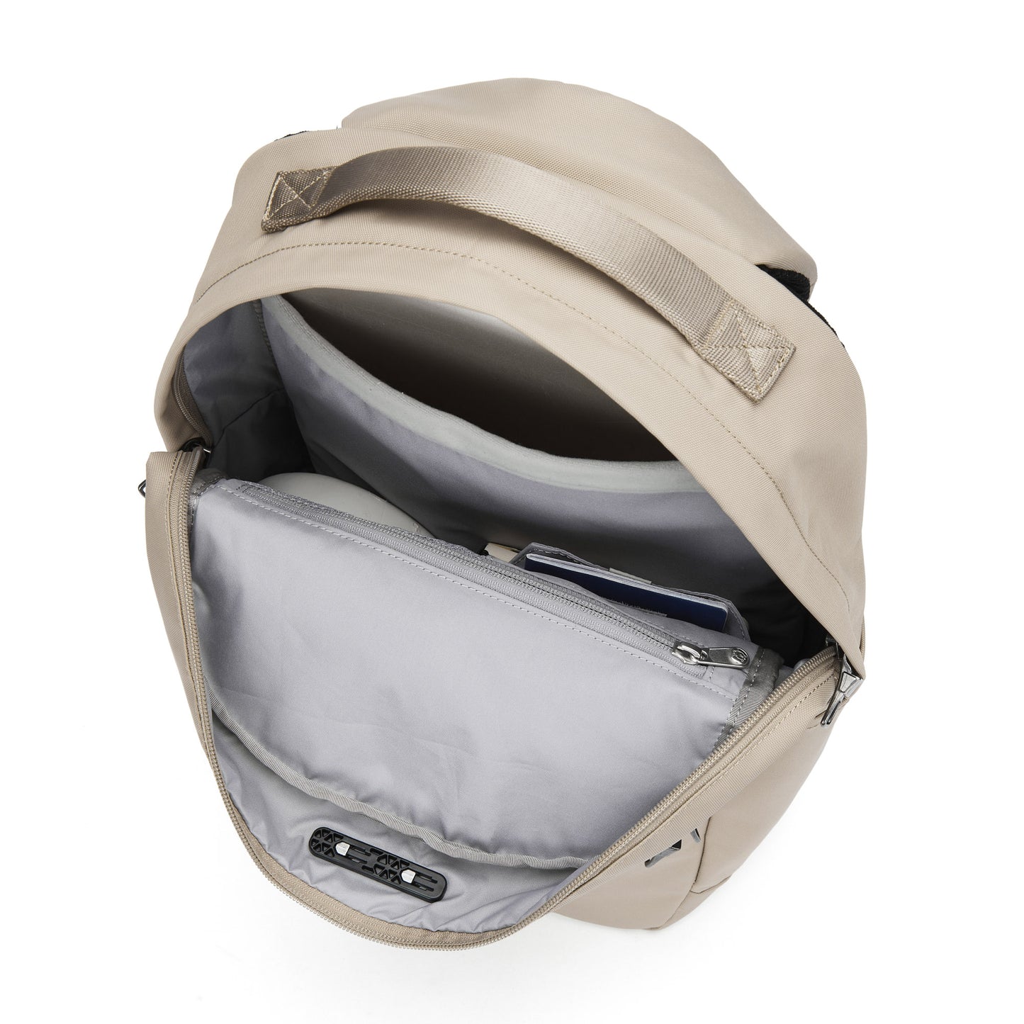 Pacsafe® V 20L Anti-theft City Backpack unzipped to reveal recycled polyester lining and laptop sleeve.