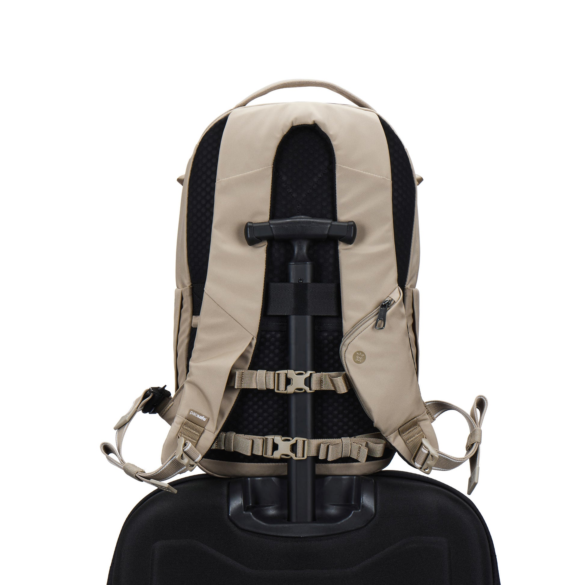Pacsafe® V 26L Anti-theft Tour Backpack in beige on a black suitcase handle, shown from the back.