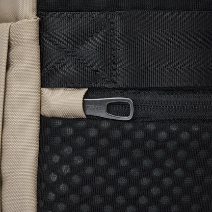 Close-up of the Pacsafe® V 26L Anti-theft Tour Backpack in black and beige with a dotted texture by Pacsafe.