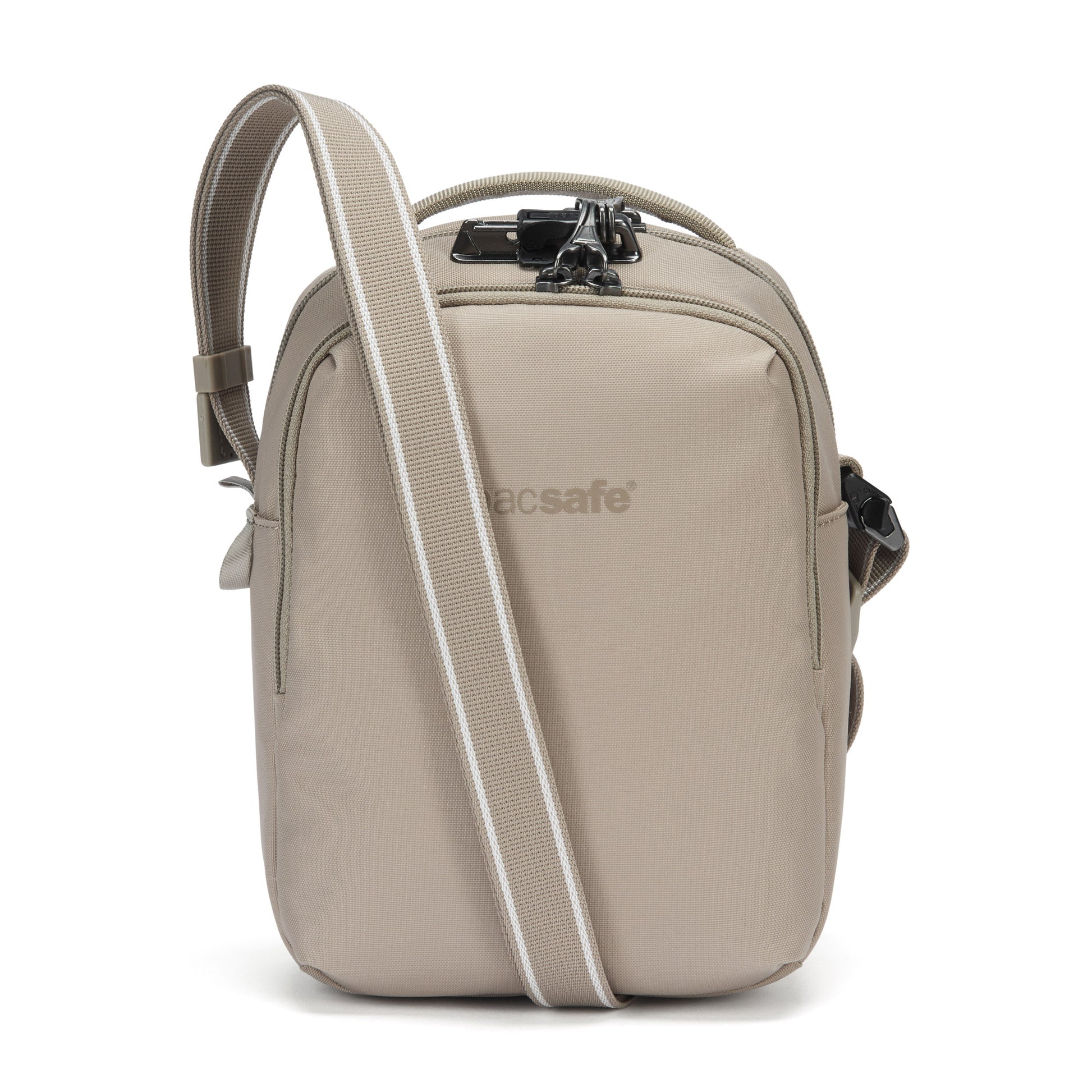 Pacsafe® V Anti-theft Companion Crossbody by Pacsafe features 2 zip pockets & adjustable striped strap in beige.