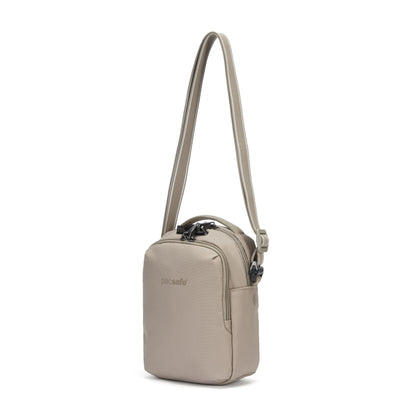 Light brown Pacsafe® V Anti-theft Companion Crossbody by Pacsafe, recycled polyester, adjustable strap.