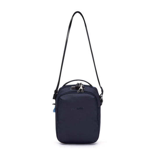 Product Image – The Pacsafe® V Anti-theft Companion Crossbody is a navy recycled bag with top handle, strap, and lock.