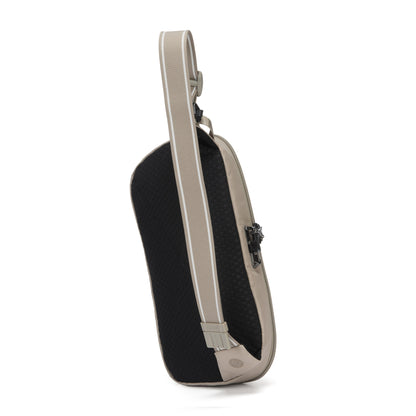 The Pacsafe® V Anti-theft Urban Sling by Pacsafe, in black/beige, with one strap, side view on white.