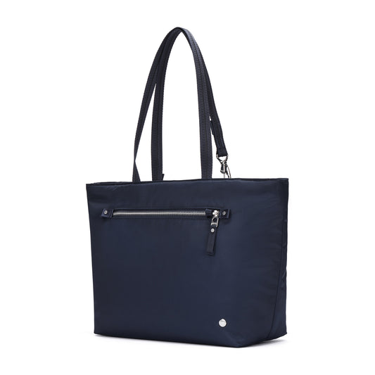 Product Image – Pacsafe® W Anti-theft Carryall Tote in navy blue, spacious with long handles and front zip pocket, recycled polyester.