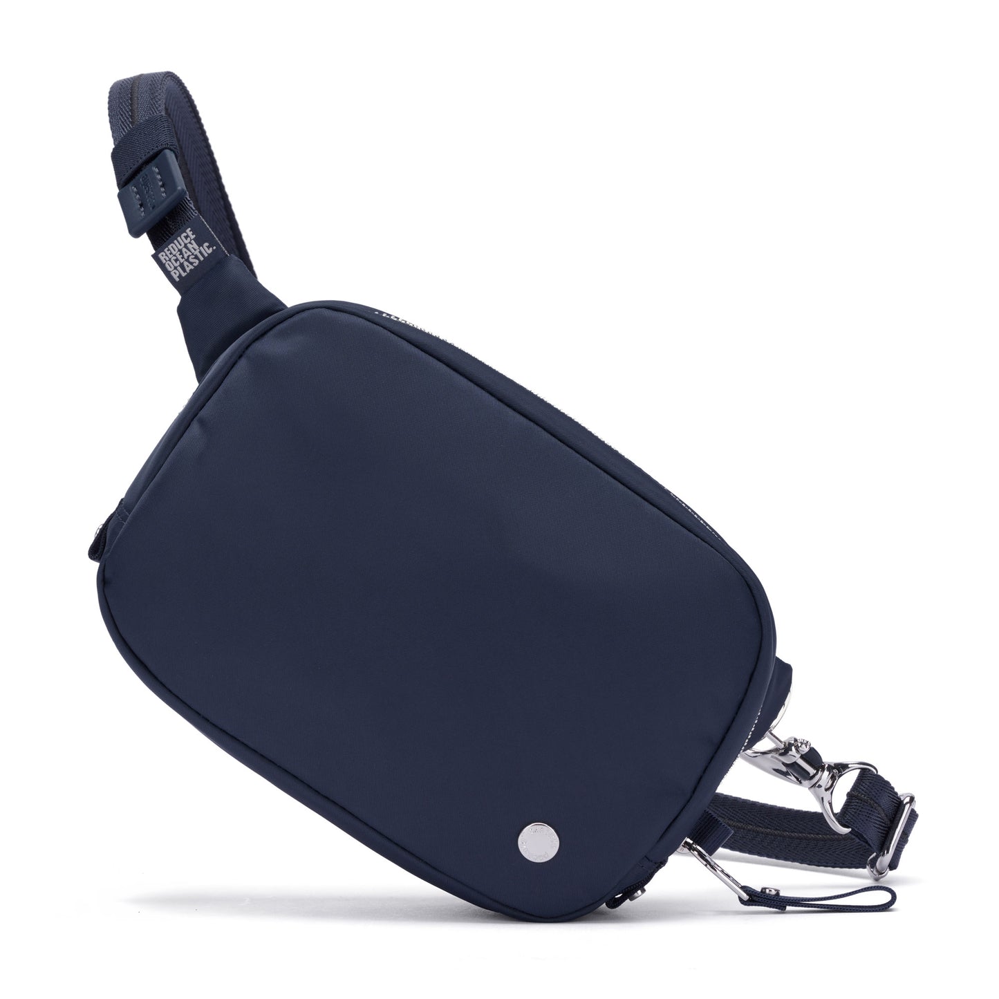 Pacsafe® W Anti-theft Micro Sling: navy blue recycled polyester, RFID blocking, adjustable strap, metal details.