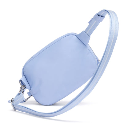 Pacsafe® W Anti-theft Micro Sling in light blue with RFID blocking, adjustable strap & silver hardware.