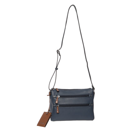 Seven Days Baobab vegan leather crossbody in dark blue with adjustable strap, 2 zip pockets & luggage tag.
