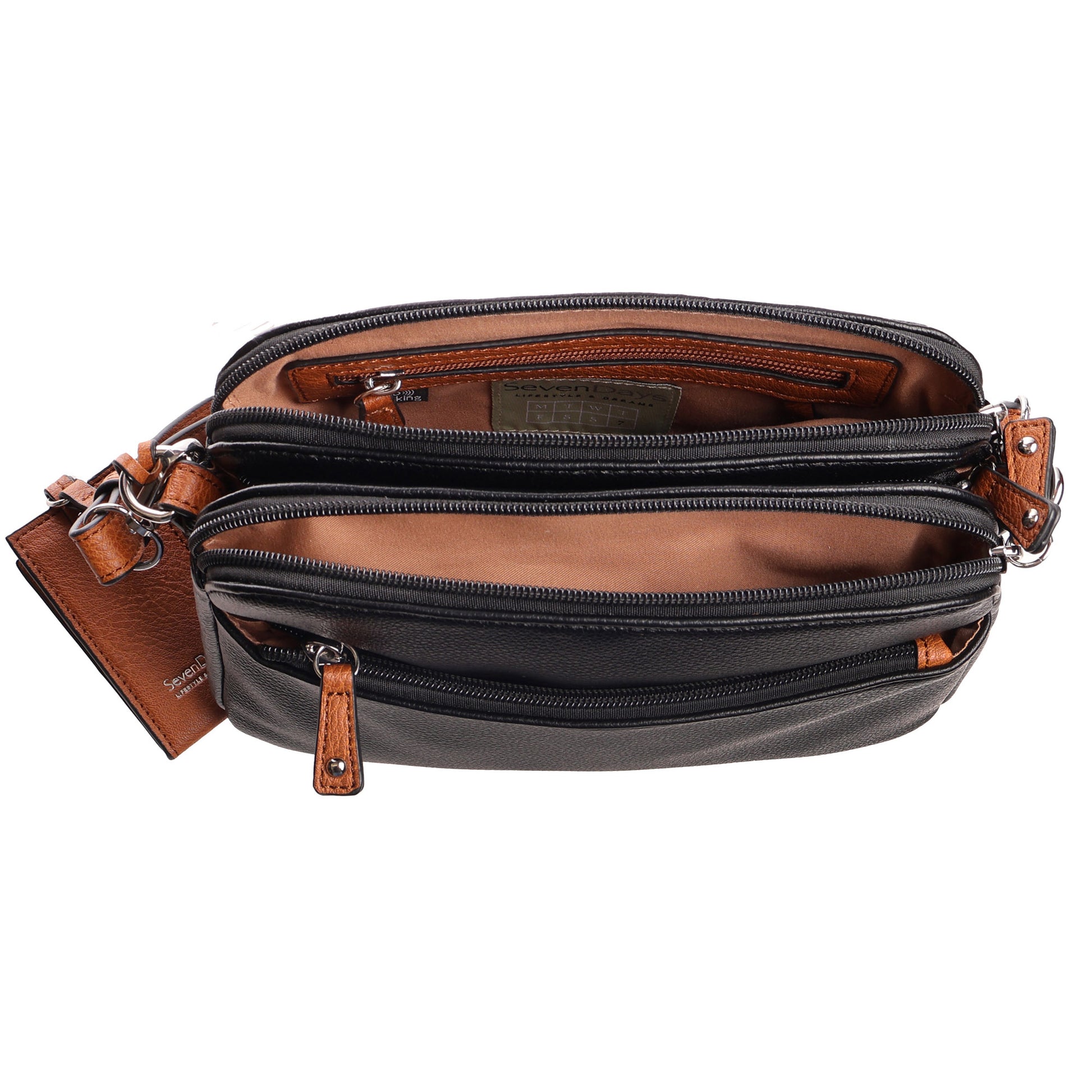 The Seven Days Darby RFID Crossbody features an adjustable strap and three open, empty compartments.