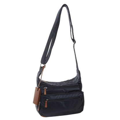 Seven Days Monkey Puzzle Nylon Crossbody: black bag with brown zippers, adjustable strap—ideal for daily use.