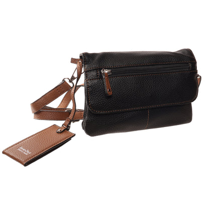 Seven Days Ivory Poplar Vegan Leather Crossbody with front zipper pocket and brown adjustable strap.