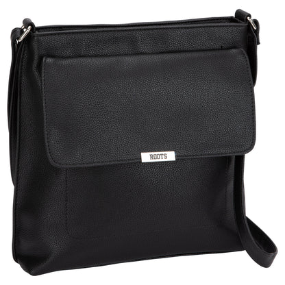 The Roots Faux Leather Crossbody Bag features a front flap, metal label, and adjustable strap.