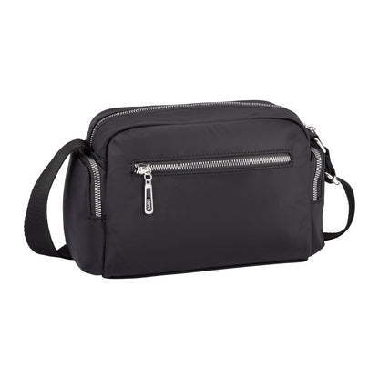 The Roots Ally Camera Crossbody is a black rectangular bag with silver zippers and an adjustable shoulder strap.