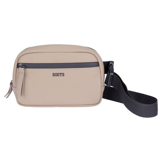 Product Image – Roots Hamilton Rounded Belt Bag by Roots in beige with water-resistant zipper, black adjustable strap, on white background.