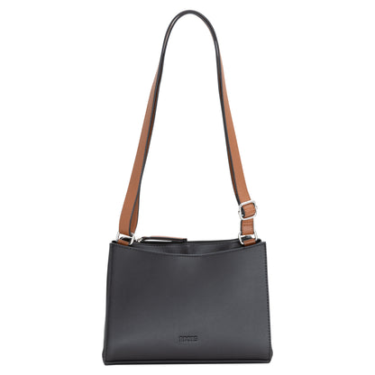Roots Crossbody bag: black, adjustable brown strap, metal buckles, rectangular shape.