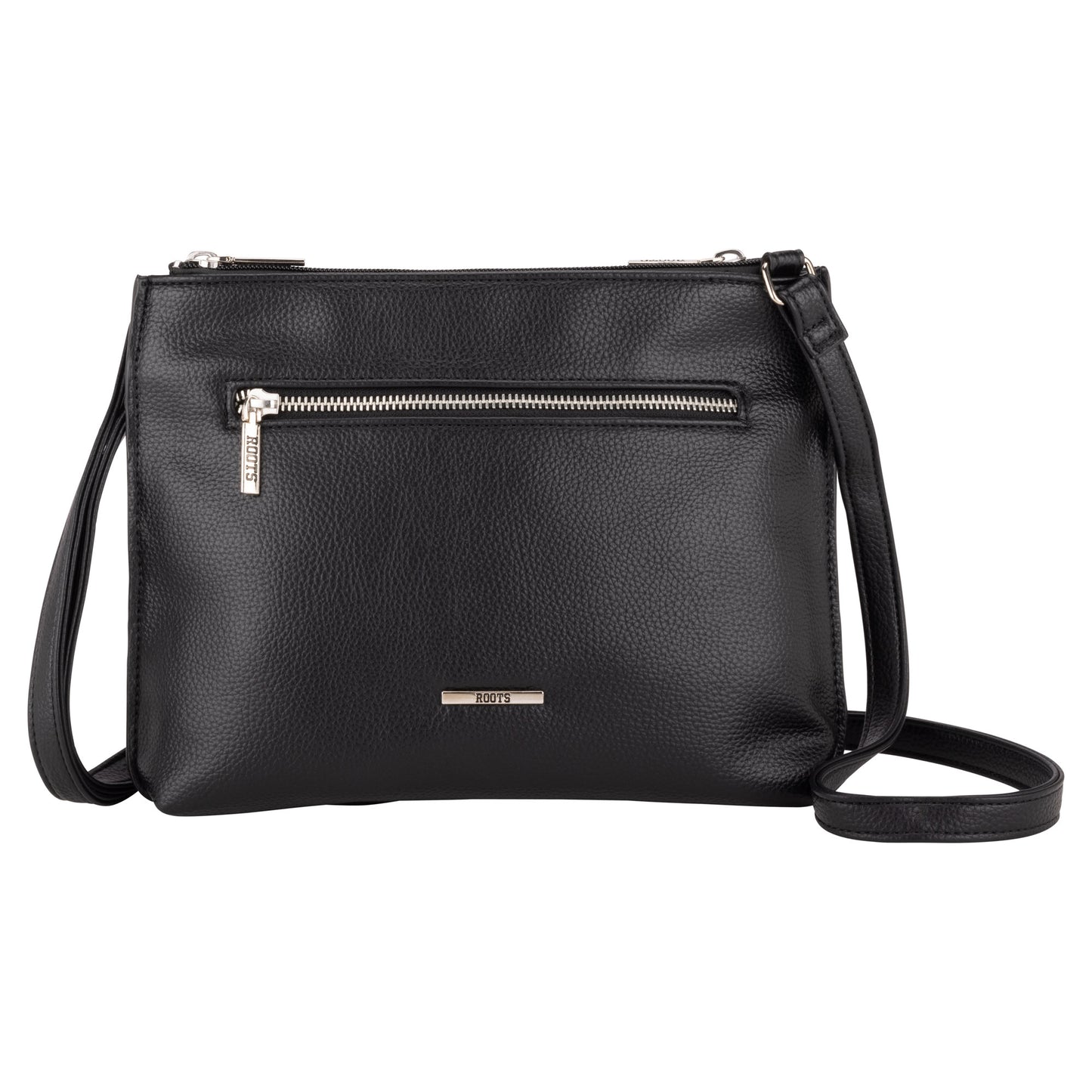 Roots 3-Compartment Crossbody by Roots—black leather with front zip pocket, adjustable strap, white background.