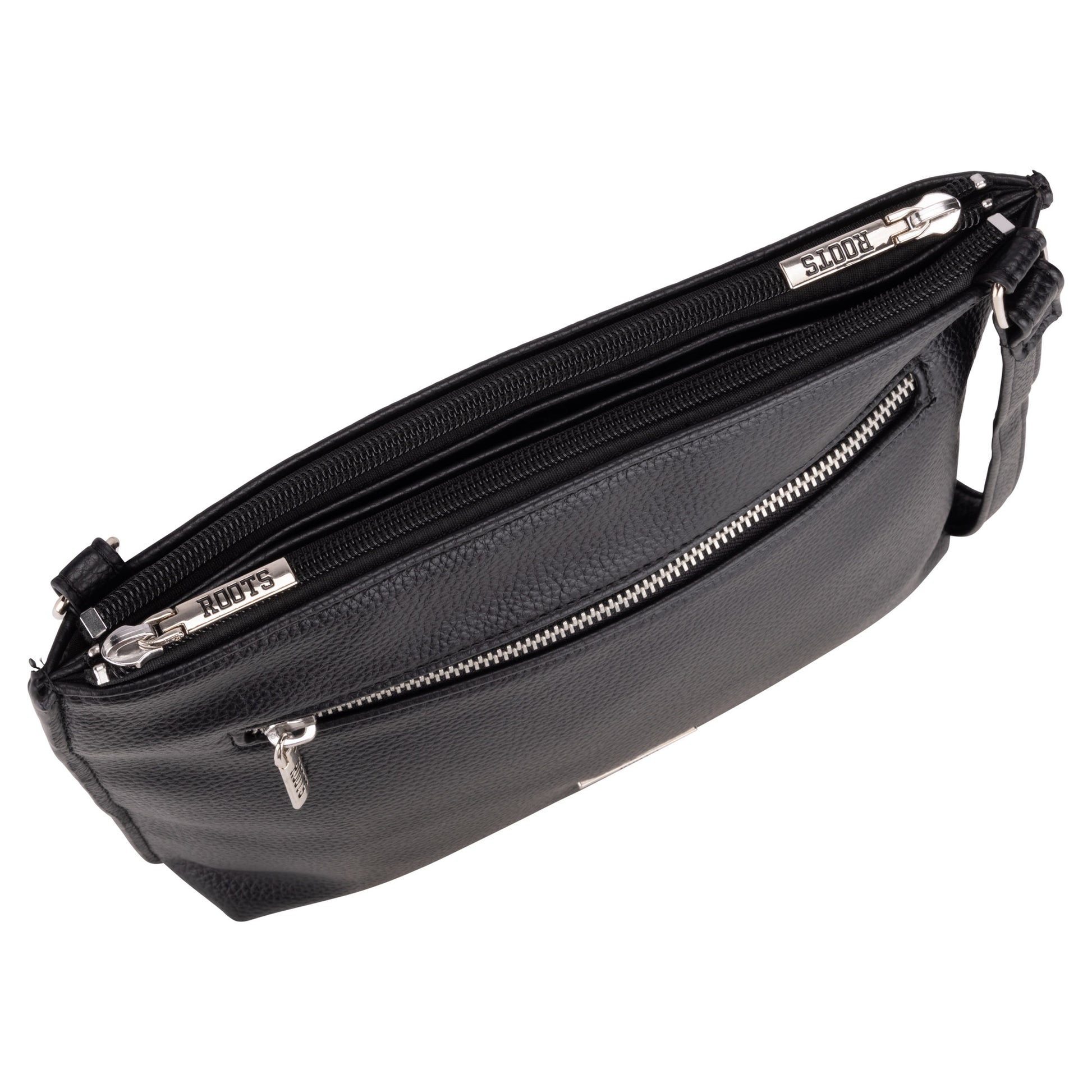 Roots 3-Compartment Crossbody by Roots in black leather with silver zippers and adjustable strap, top view.