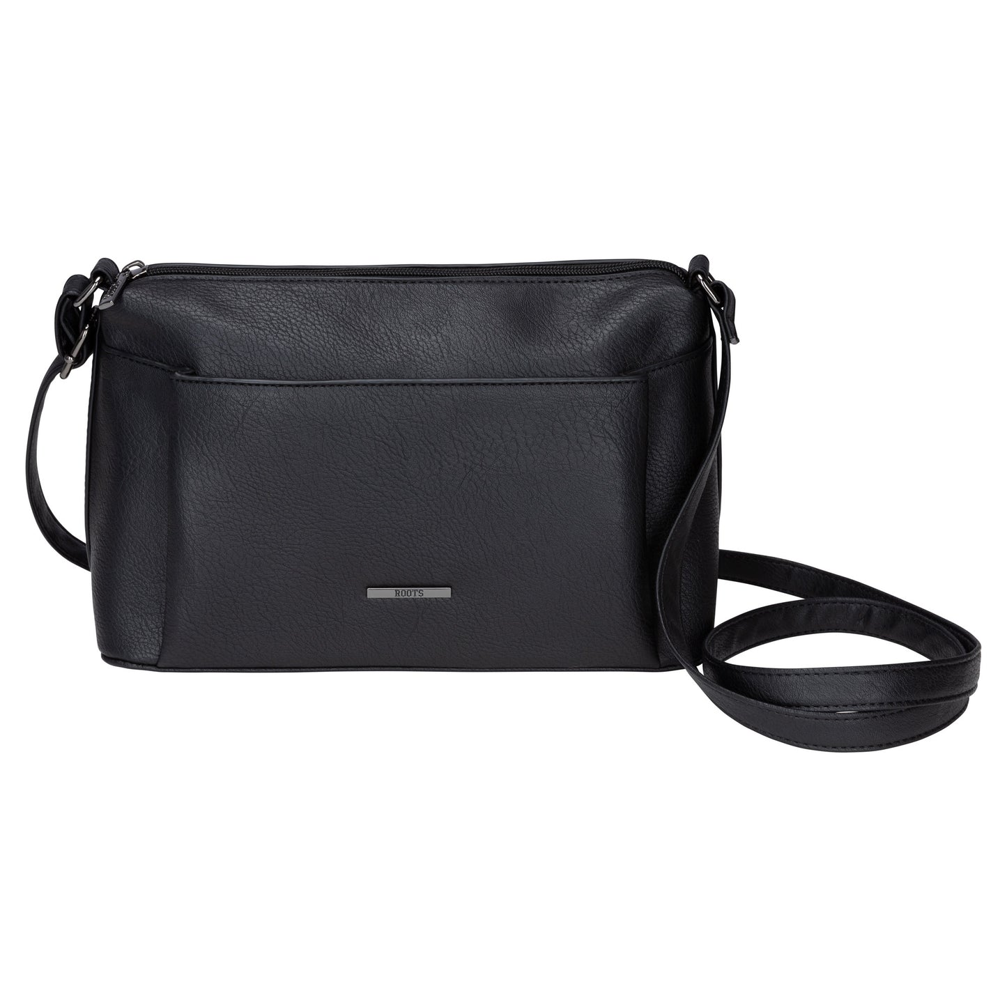 The Roots Faux Leather Top Zip Crossbody bag has a front pocket and adjustable strap, shown on white.