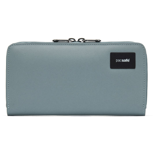 Product Image – A fresh mint Pacsafe RFIDsafe continental wallet with RFID-blocking and a black "pacsafe" logo on the top right.
