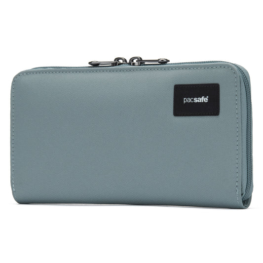 Product Image – A fresh mint Pacsafe® RFIDsafe™ wallet with zipper and black logo patch.