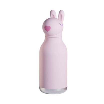 Light pink Asobu Bestie Bottle featuring a rabbit-shaped lid with a heart nose and closed eyes.