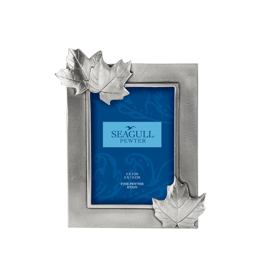 Product Image – Seagull Pewter Maple Leaf 2x3 Picture Frame, a rectangular pewter frame with maple leaf accents at two corners.
