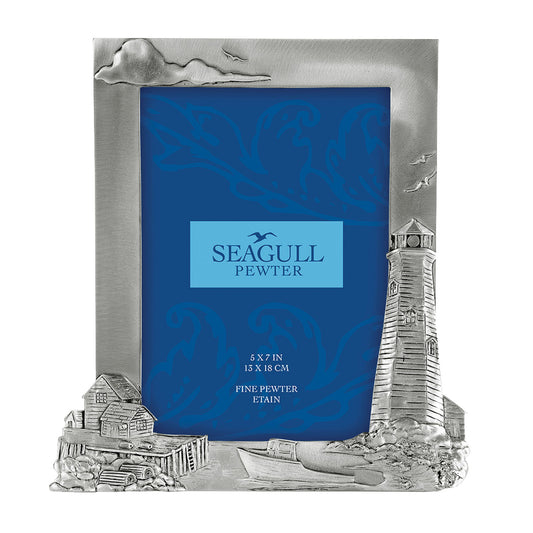 Product Image – Seagull Pewter Lighthouse 5x7 Picture Frame featuring a border with embossed coastal buildings and a boat.