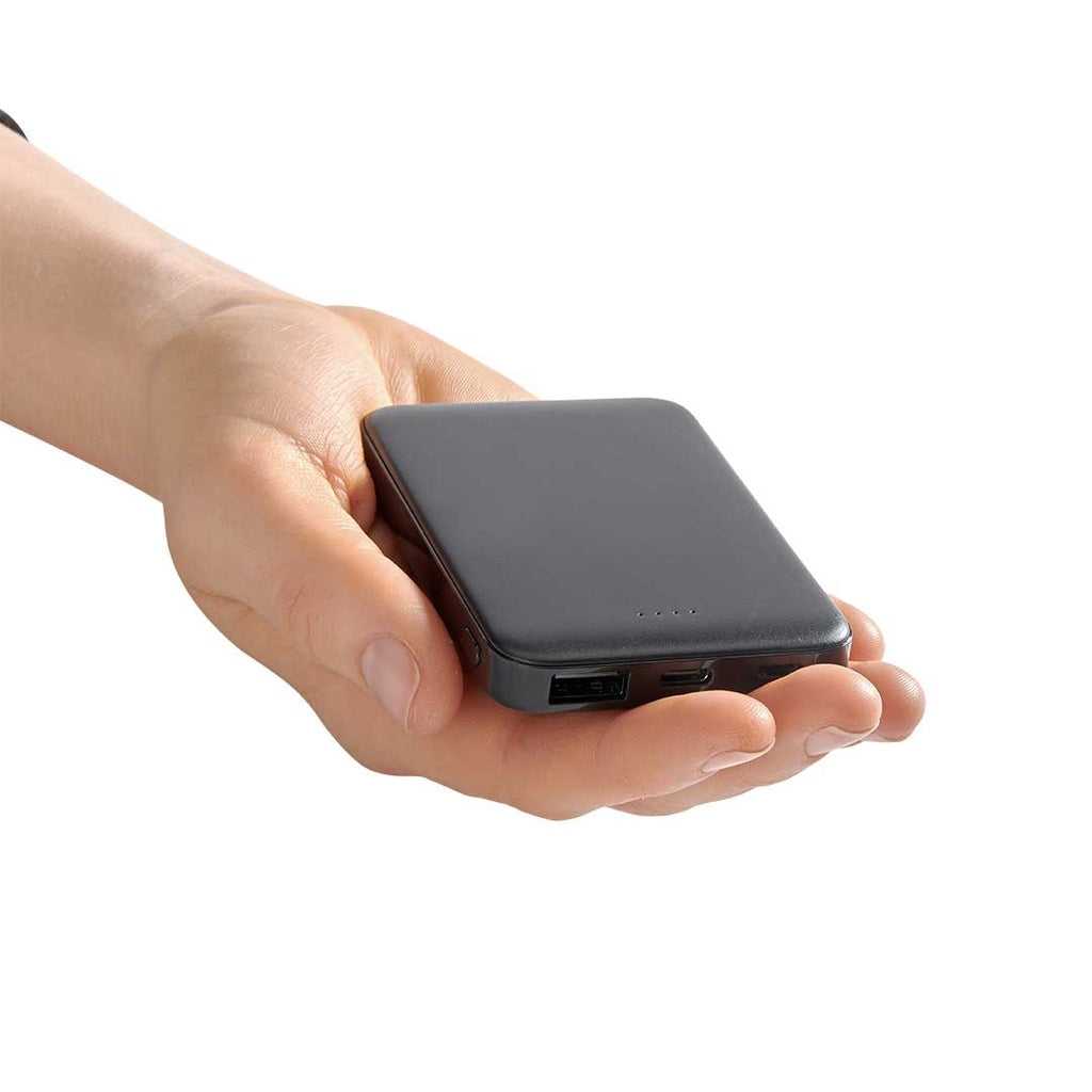 A hand holds the High Road Power Bank showing USB and micro USB ports for portable charging.