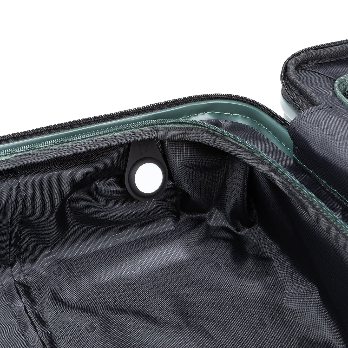 Close-up of Travelite Itinerary Medium luggage interior, showing grommet hole and zipper detail.