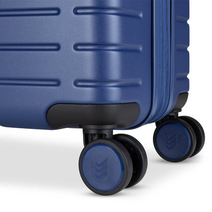 Close up of spinner wheels on set sail blue colour Travelite Epicure 24" Expandable Hardside Spinner