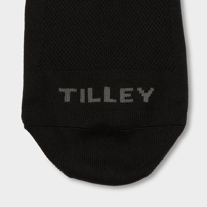 Close-up of the toe area of a Tilley Mid Calf Travel Sock, featuring “TILLEY” stitched in gray.