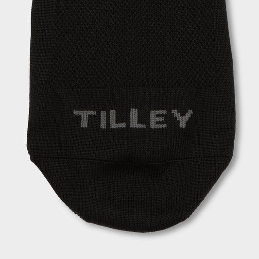 Product Image – Close-up of the toe area of a Tilley Mid Calf Travel Sock, featuring “TILLEY” stitched in gray.
