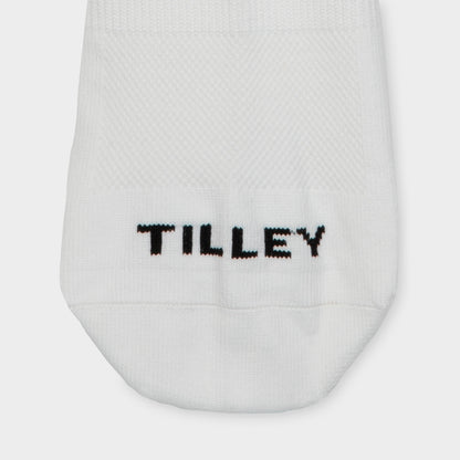 Tilley Mid Calf Travel Sock in white with "TILLEY" embroidery and arch support. Online only.