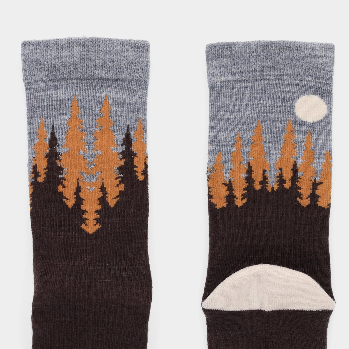 Tilley Landscape Sock: Gray and brown merino socks with forest, orange trees, and a moon on the ankle. ONLINE ONLY.