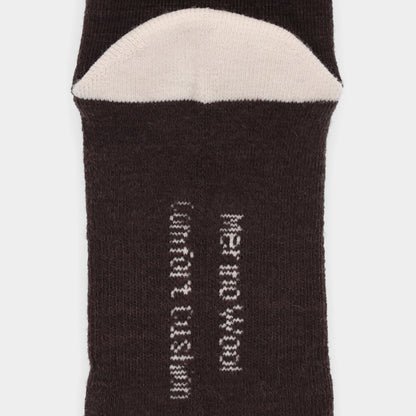 Close-up of Tilley Landscape Sock—ONLINE ONLY; dark merino with white toe and odour eliminating text.