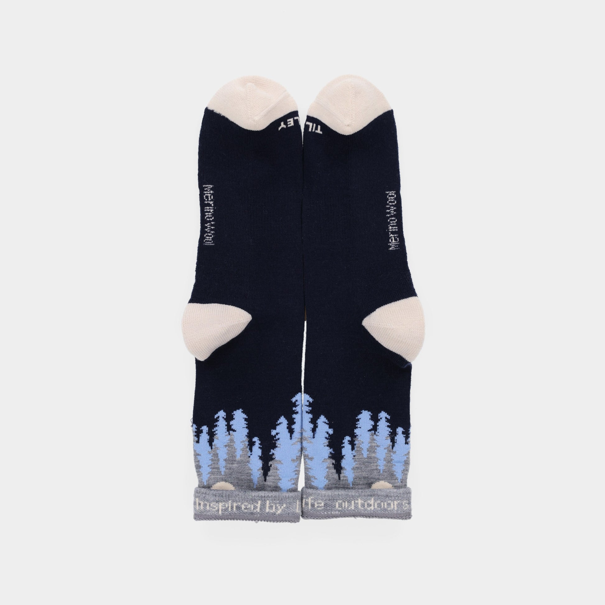 Tilley Landscape Sock—navy merino with beige toes/heels and blue-gray forest design. ONLINE ONLY.