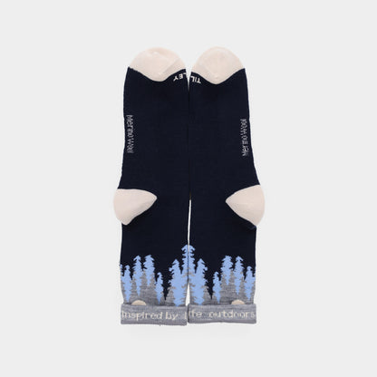 Tilley Landscape Sock—navy merino with beige toes/heels and blue-gray forest design. ONLINE ONLY.