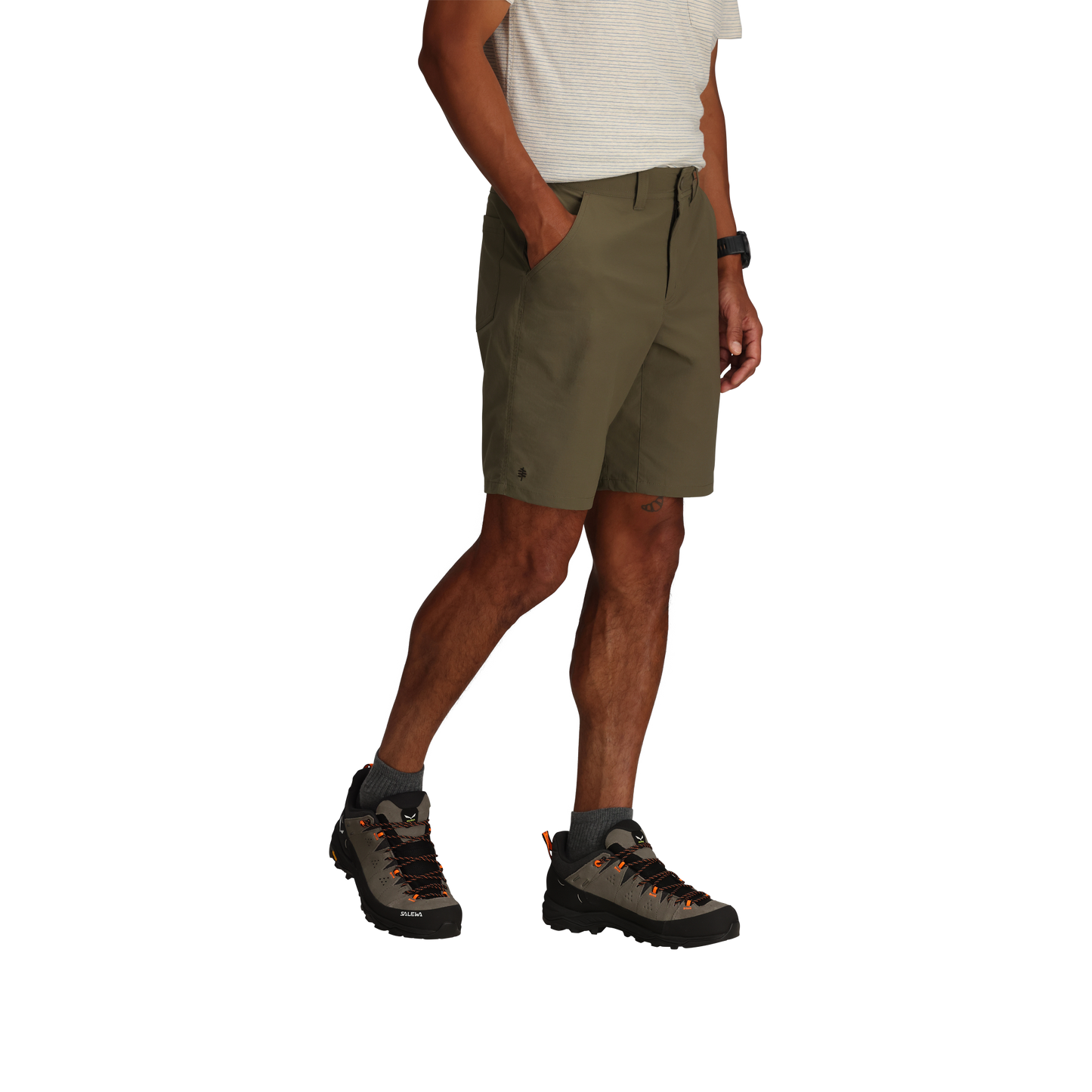 Man wearing Royal Robbins Wilder Shorts and boots, standing against a white background.