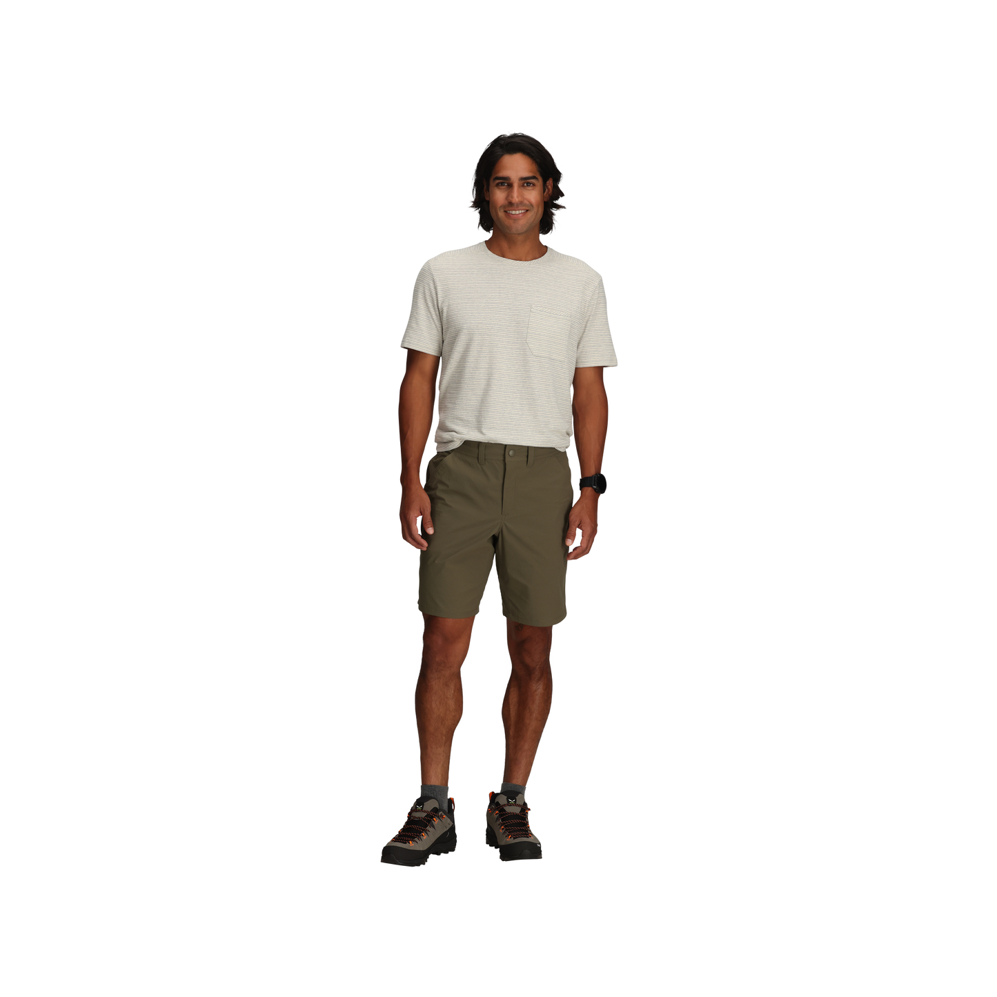 Man standing and smiling, wearing a light t-shirt, Royal Robbins Men's Wilder Shorts, and boots on a plain background.