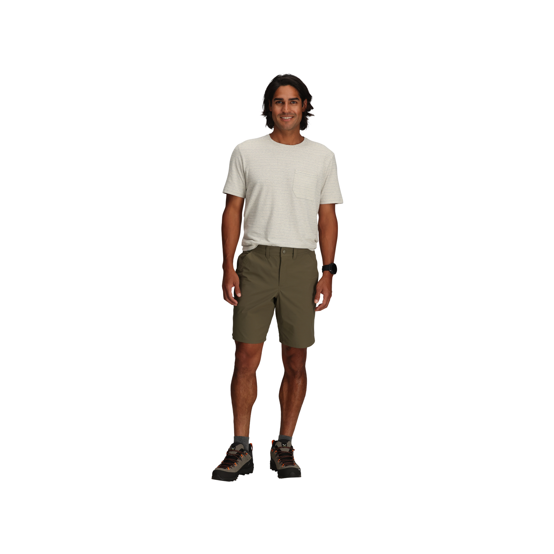 Man standing and smiling, wearing a light t-shirt, Royal Robbins Men's Wilder Shorts, and boots on a plain background.