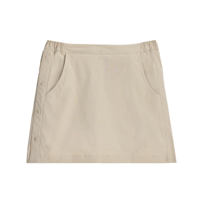 Royal Robbins Women's Wilder Skort features side buttons, front pockets, and built-in bike shorts for adventure.