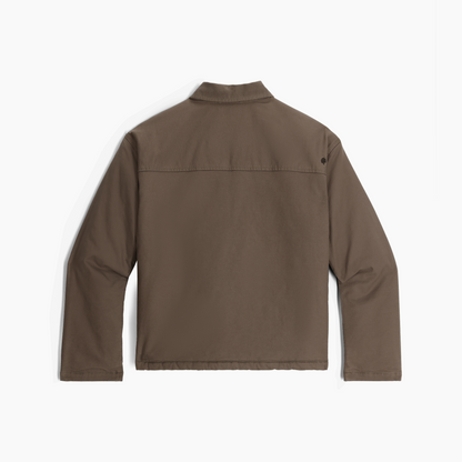 Royal Robbins Women's El Cap Canvas Shacket in brown shown from the back on a white background.